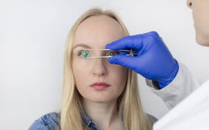 A conceptual image depicting the replacement of an eye's crystalline lens, similar to multifocal lens implants.