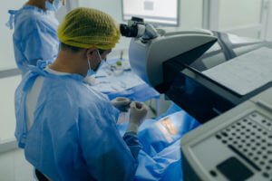 Laser eye surgeons performs eye surgery in a modern clinic for vision correction.